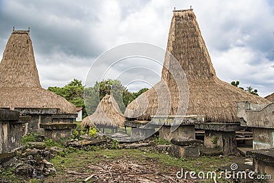 Typical houses with tall roofs, Kodi, Sumba Island, Nusa Tenggara Stock Photo